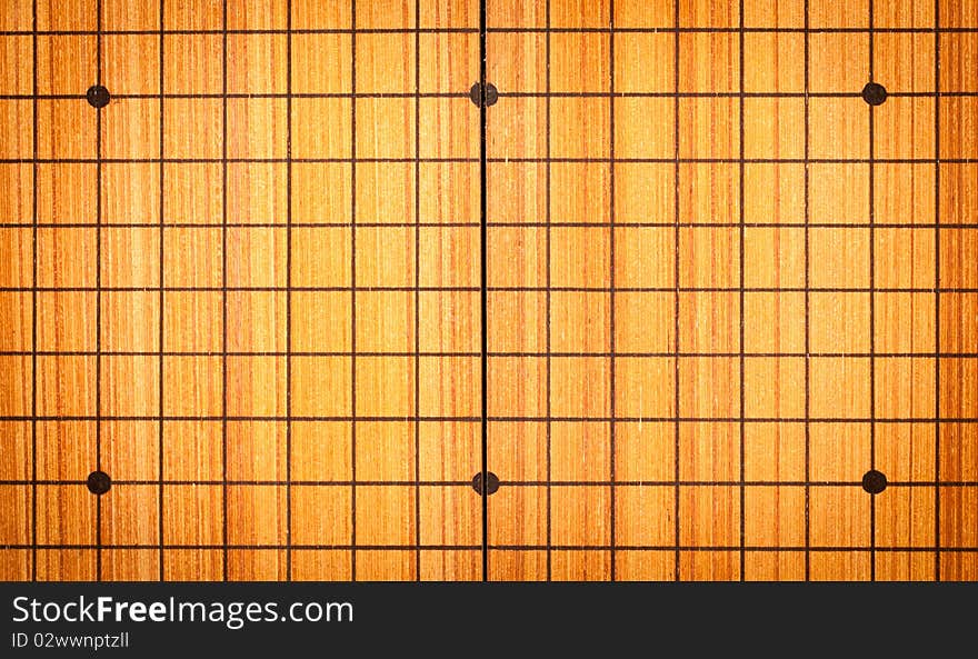 Wooden Japanese checker board background. Wooden Japanese checker board background