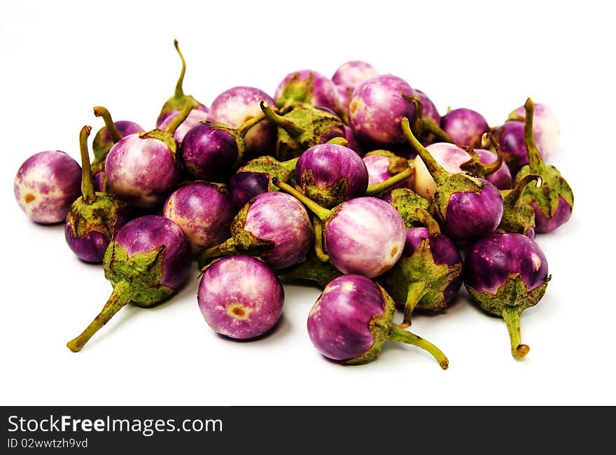 Group of small Egg-plants. Aubergine. Isolated over white.