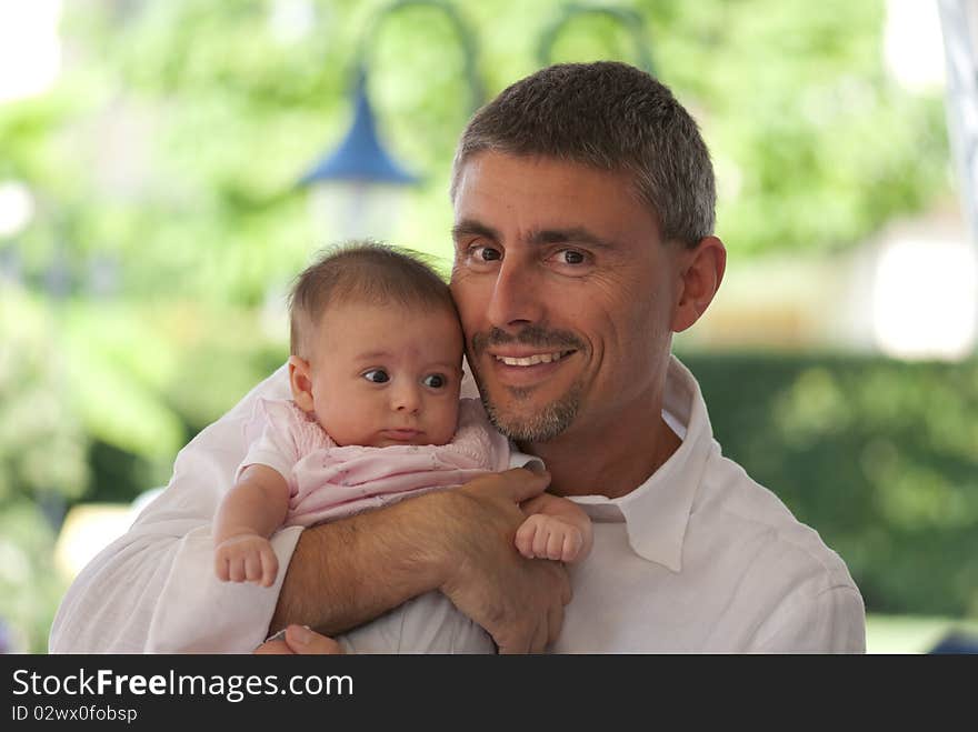 Father Hugging his Daughter at a Party, Italy. Father Hugging his Daughter at a Party, Italy