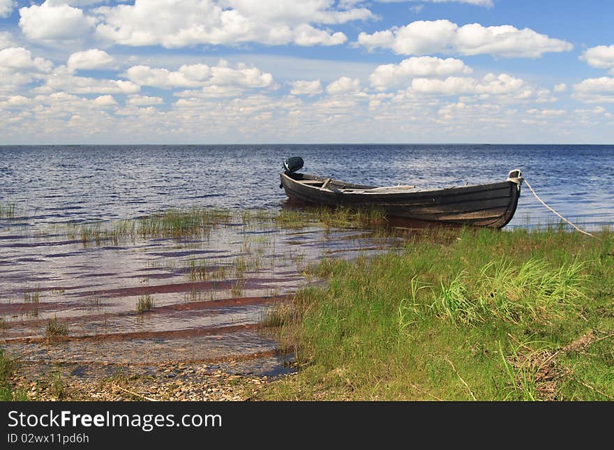 Fishing wooden boat in a lake, north Russia