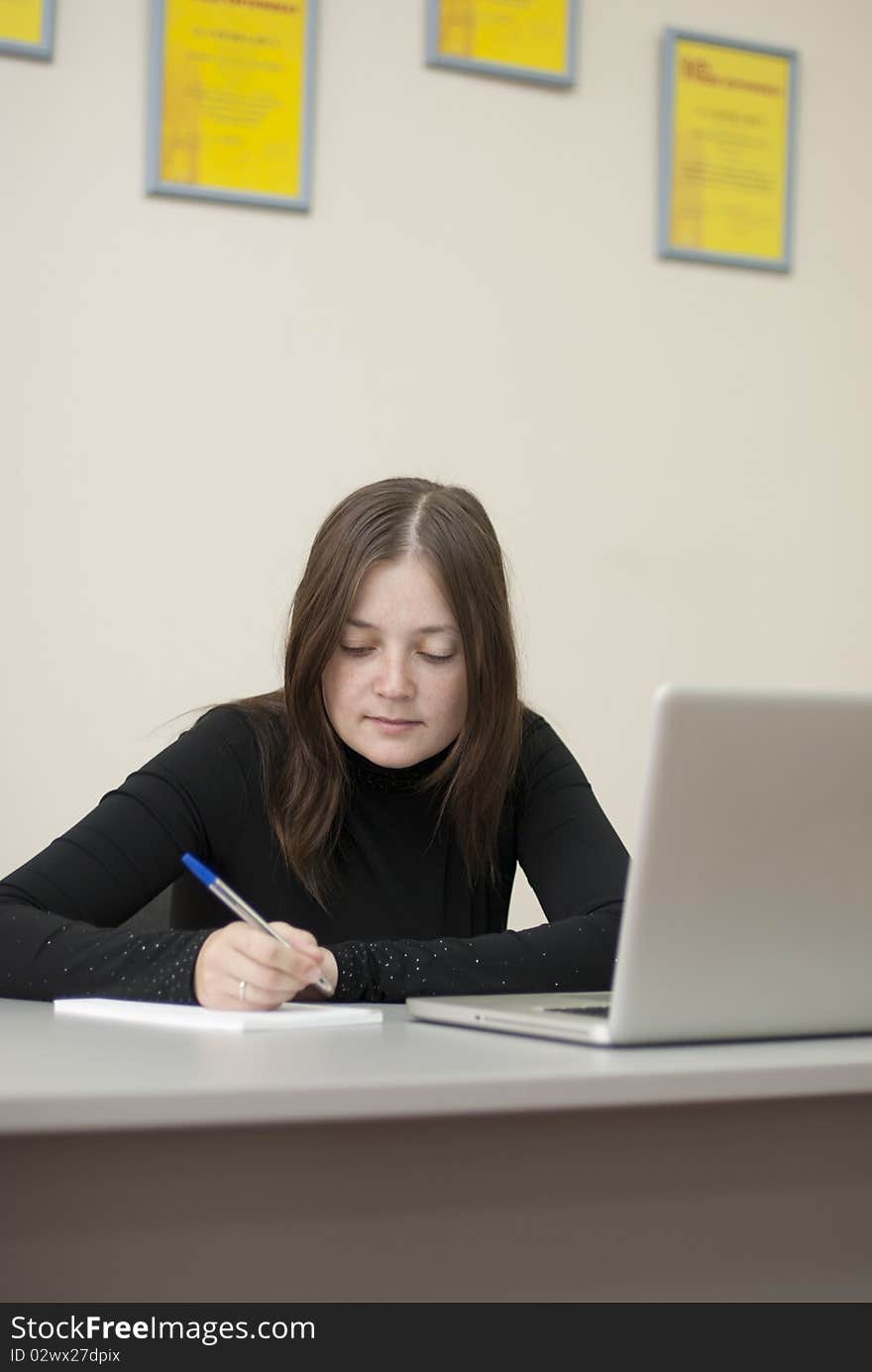 Business woman writing text in office