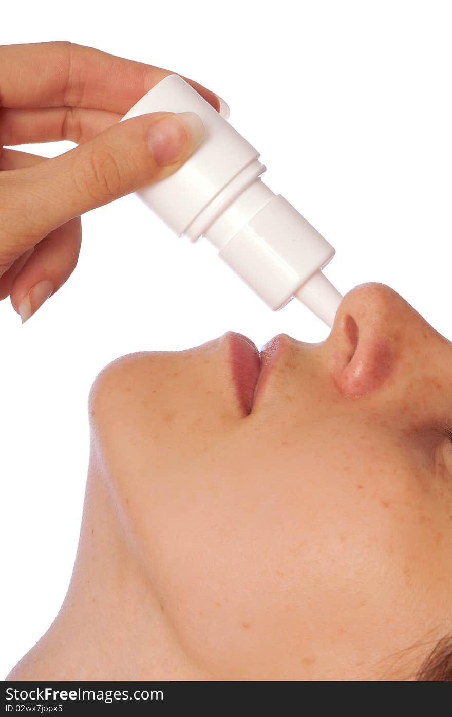 The woman drips drops for a nose for fast recover