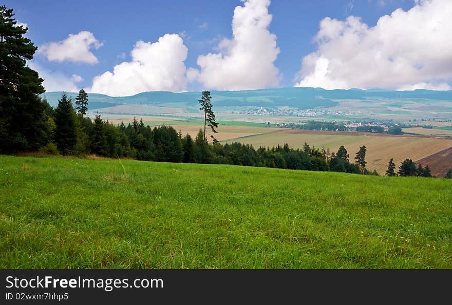 View of fields forest with mountain background , image was taken in Slovakia. View of fields forest with mountain background , image was taken in Slovakia