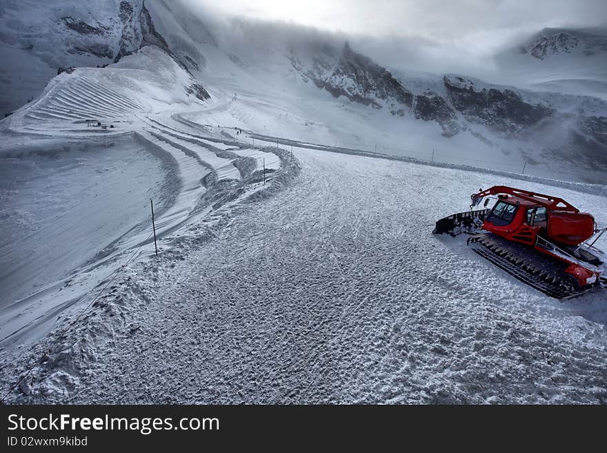 Snow grooming is the process to manipulate snow for recreational uses, usually using a snow groomer vehicle. Here is an example of a snow groomer in Saas Fee , Swiss Alps. Snow grooming is the process to manipulate snow for recreational uses, usually using a snow groomer vehicle. Here is an example of a snow groomer in Saas Fee , Swiss Alps.