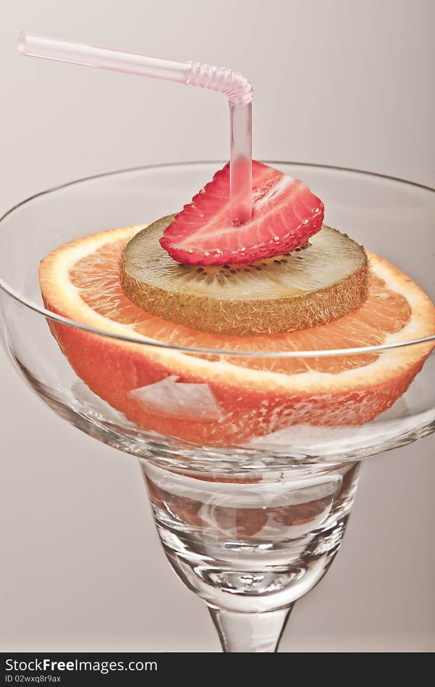 Glass with fresh fruit, concept of healthy drink. Glass with fresh fruit, concept of healthy drink