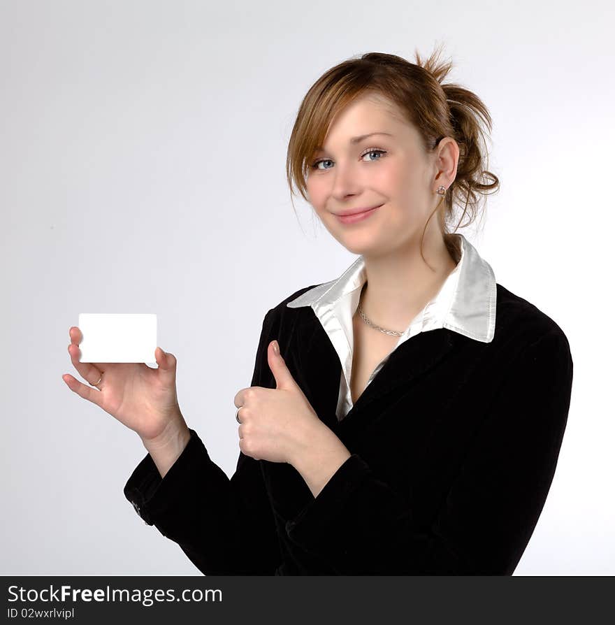 Businesswoman holding a blank card, isolated on a white background