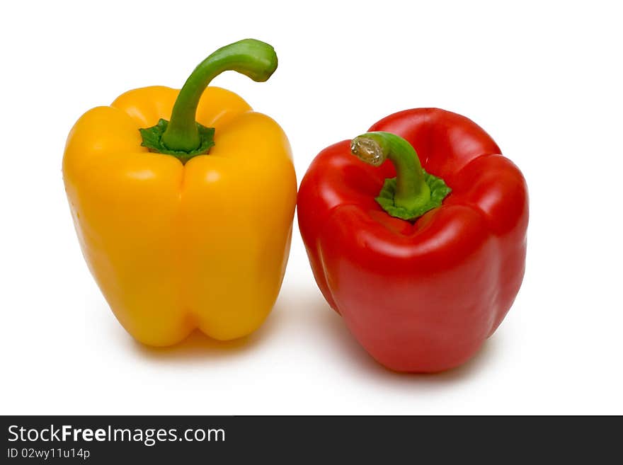 Two bell peppers on white background