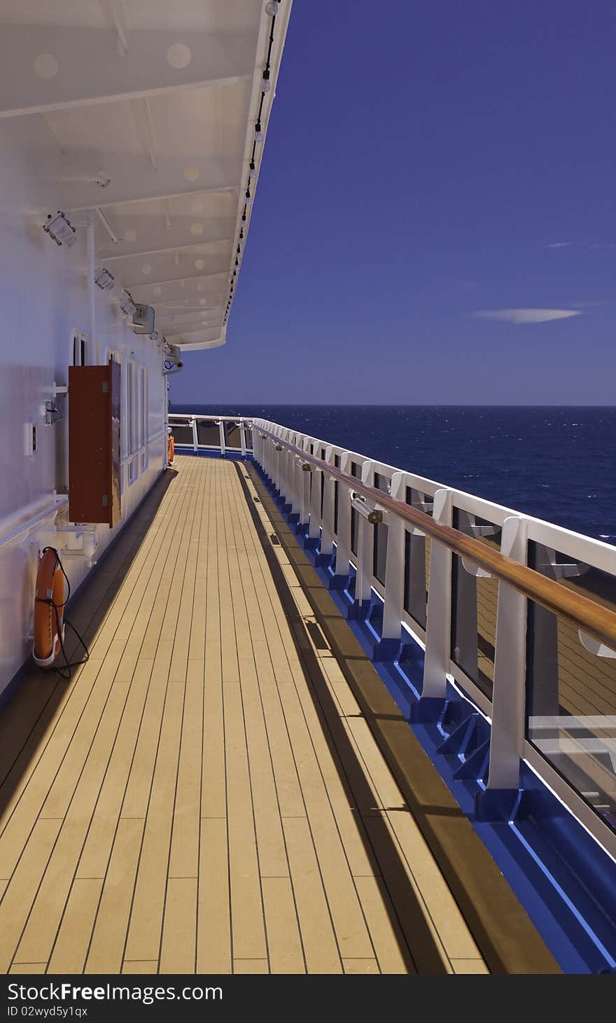 An empty deck beckons world weary passengers to find some peace and quiet to relax and soak up the Caribbean sun on the deck of the Carnival Dream. An empty deck beckons world weary passengers to find some peace and quiet to relax and soak up the Caribbean sun on the deck of the Carnival Dream.