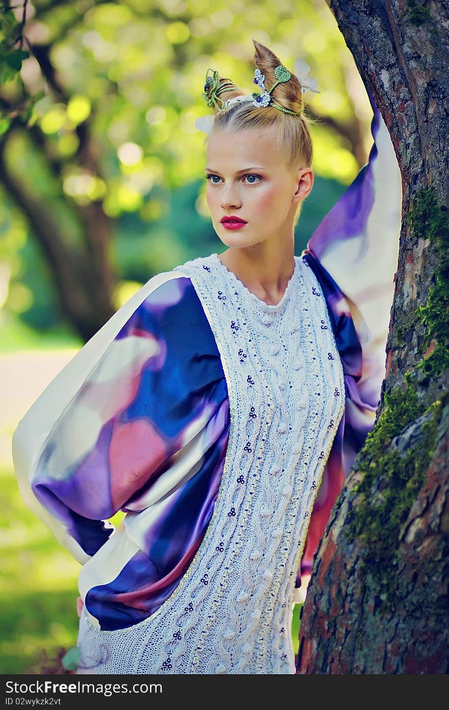 Young girl in nature, fantasy make-up