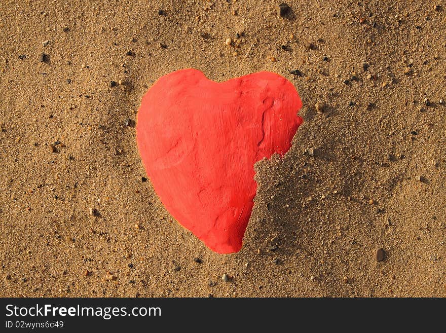 Heart shape in sand on a beach