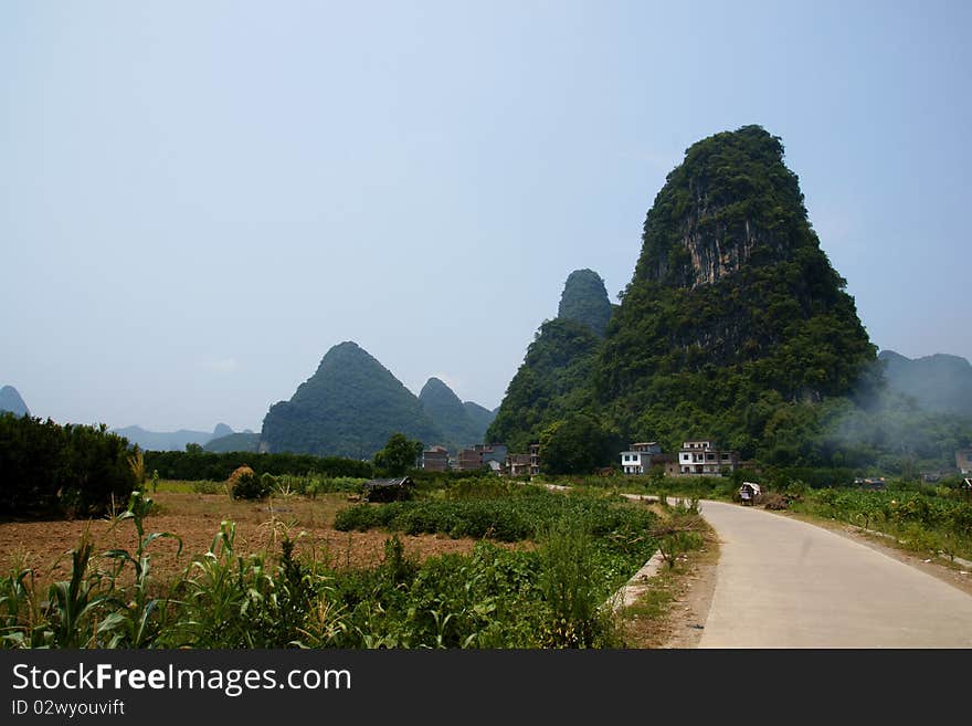 A mountain and rural Landscape of Yangshuo, China. A mountain and rural Landscape of Yangshuo, China