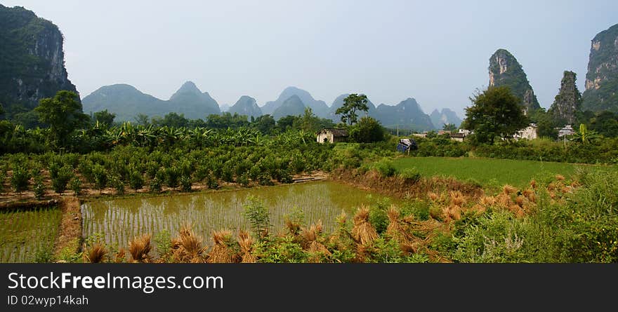 A mountain and rural panoramic Landscape of Yangshuo, China. A mountain and rural panoramic Landscape of Yangshuo, China