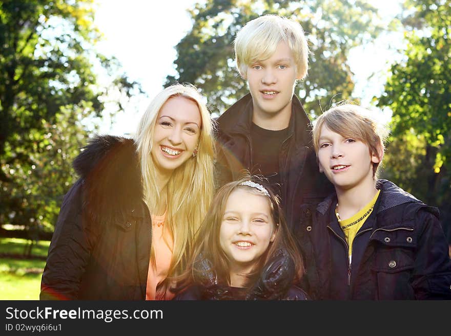 Happy family have fun and stroll in park. Happy family have fun and stroll in park