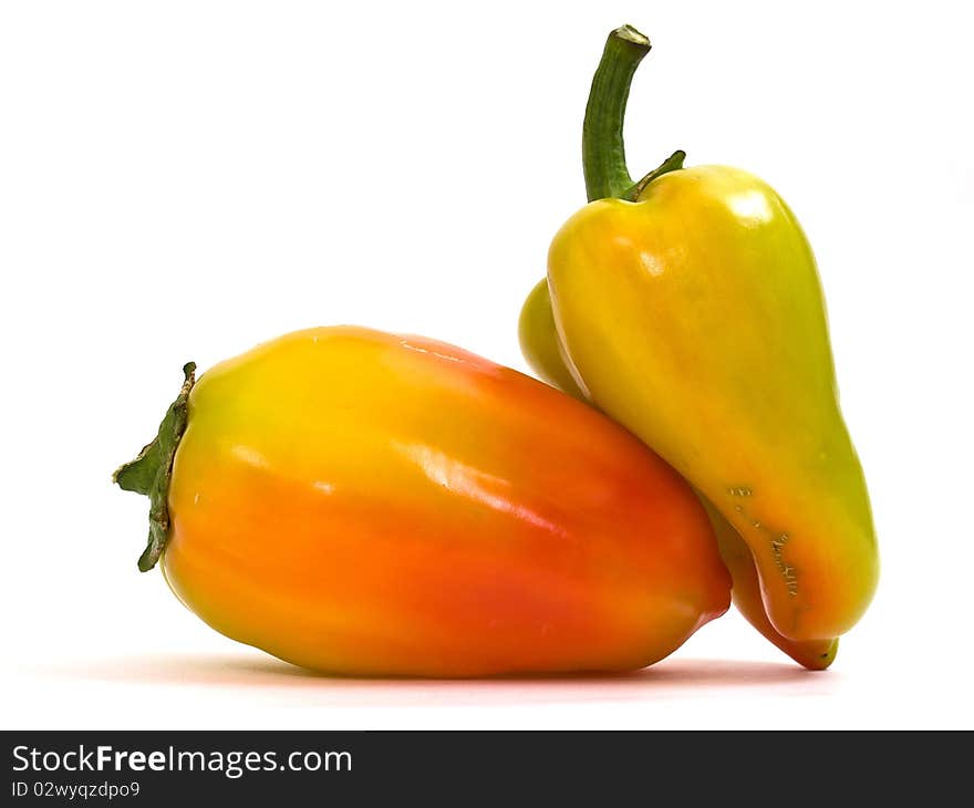 Colorful fresh peppers isolated on white background