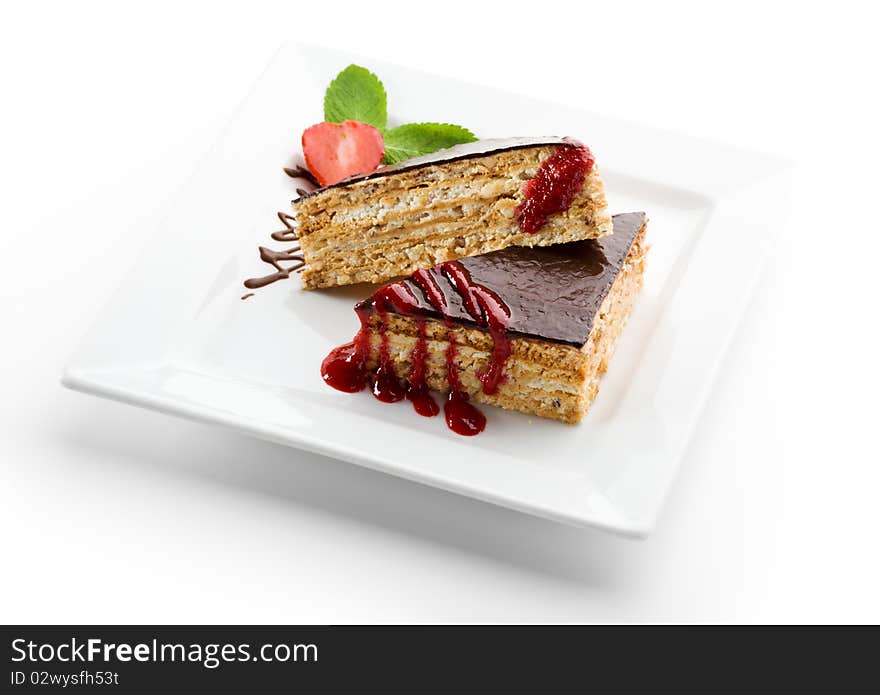 Dessert - Chocolate Nuts Cake with Berries Jam, Strawberry and Fresh Mint