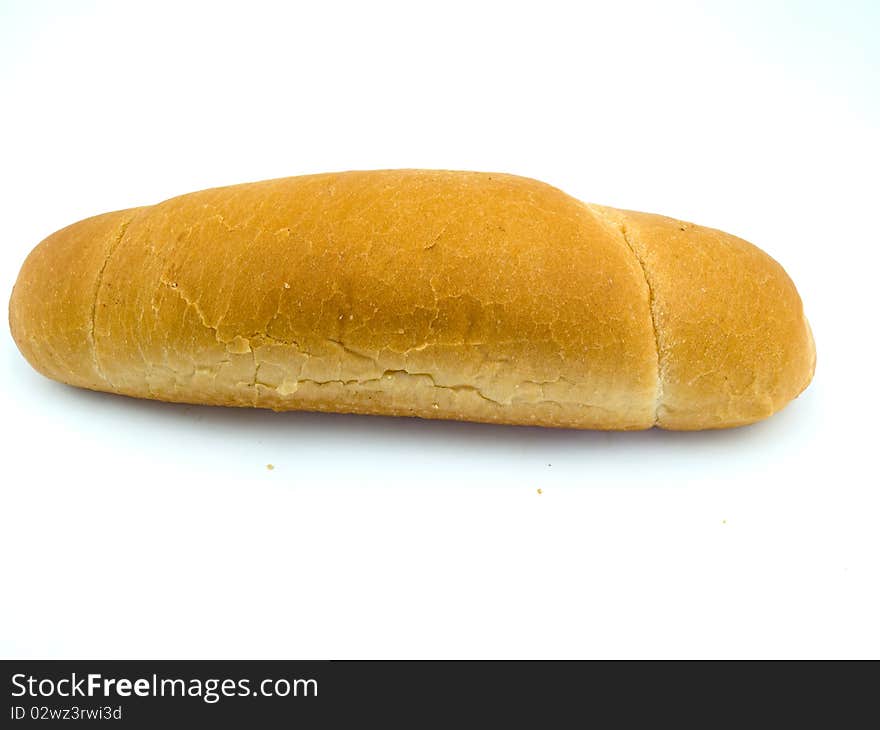 One appetizing croissant with a golden crust is located on a white background