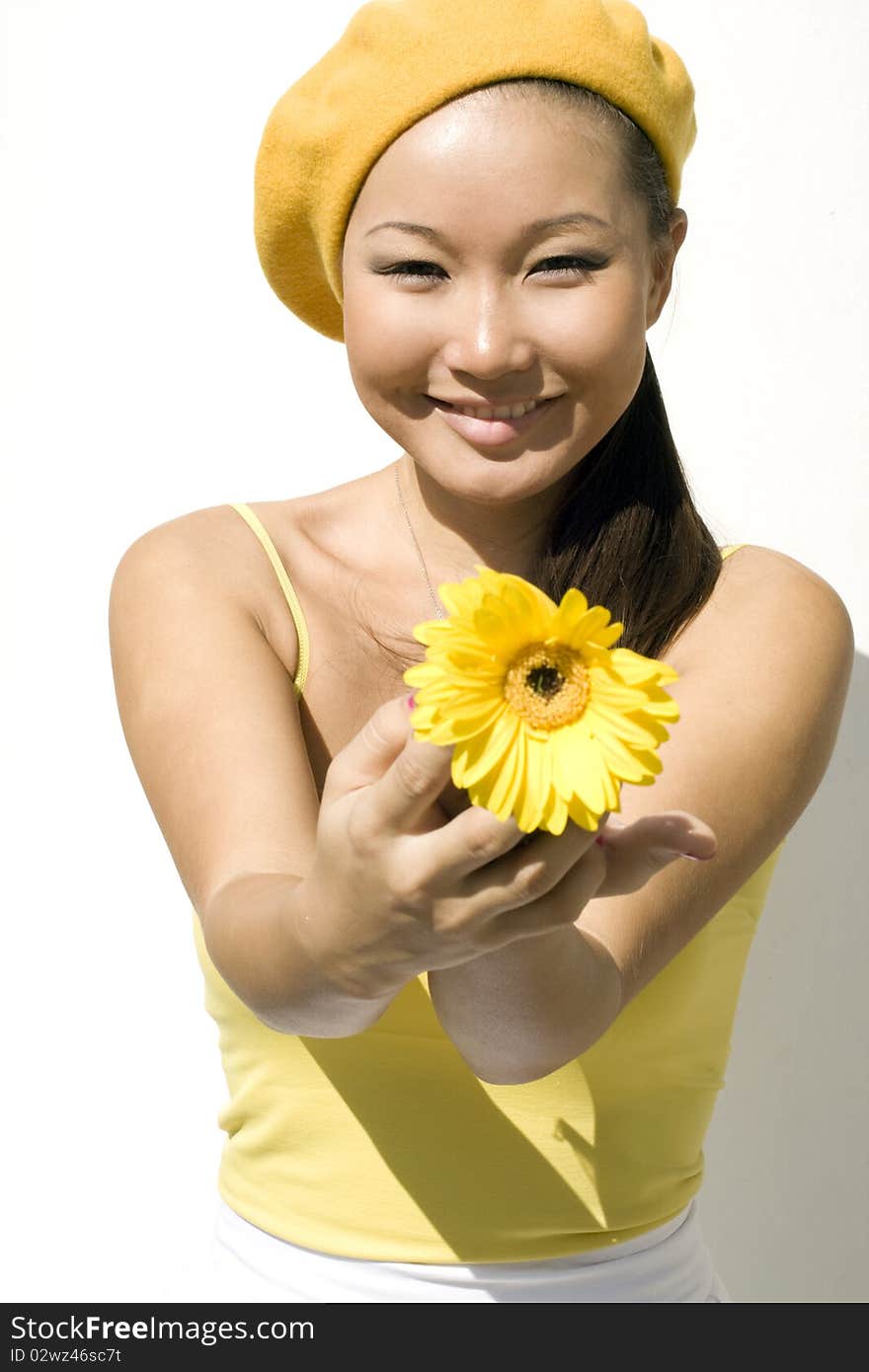 Closeup Portrait Of A Girl With Flower