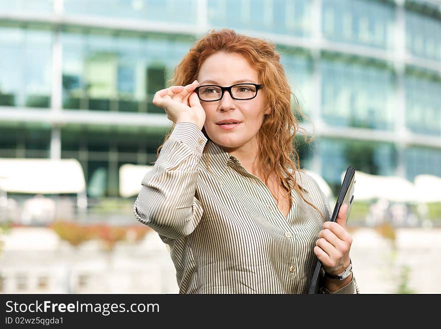 Real office worker posing for camera outdoor