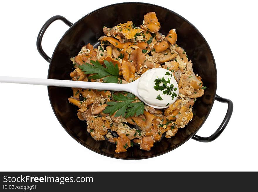 Mushroom food with chanterelles, vegetarian meal cooked with parsley