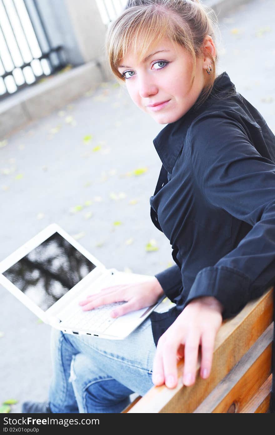 The girl with the notebook. City park