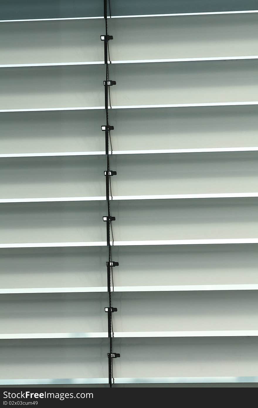 Detail of closed aluminum window blind