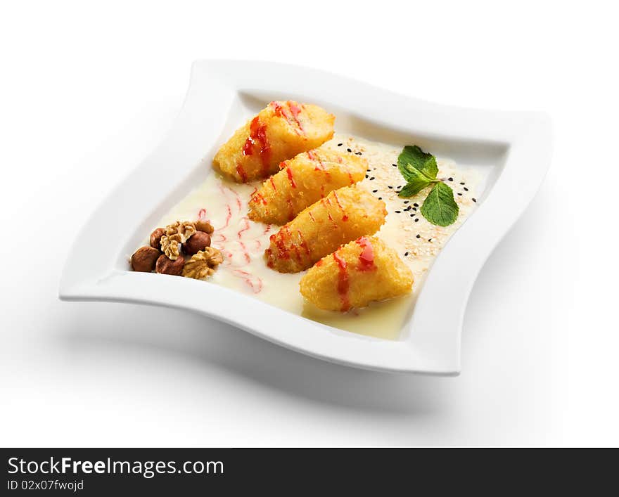 Dessert - Deep Fried Banana Slice with Vanilla Sauce and Honey Nuts. Dessert - Deep Fried Banana Slice with Vanilla Sauce and Honey Nuts