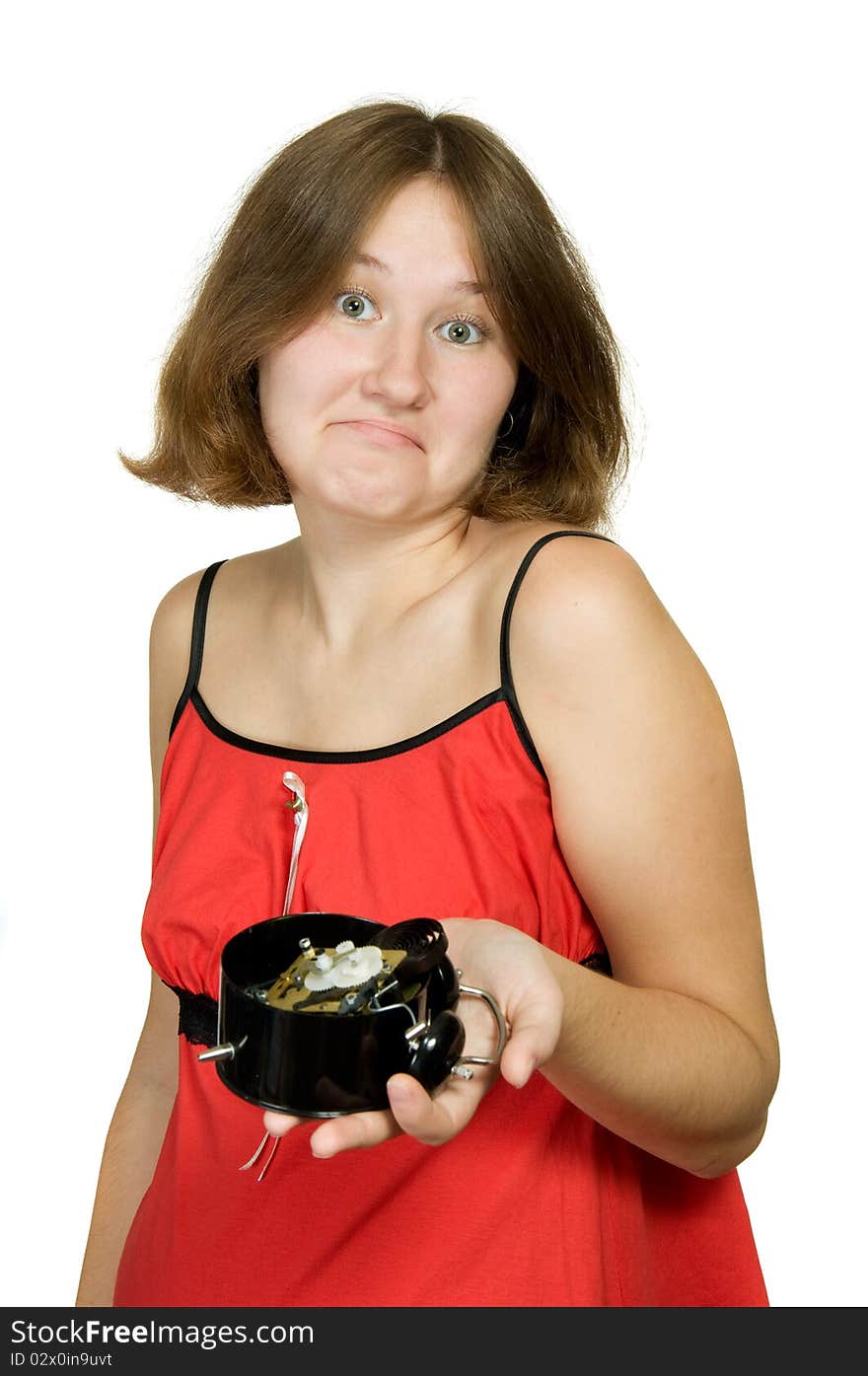 Portrait of attractive woman with broken alarm-clock over white. Portrait of attractive woman with broken alarm-clock over white