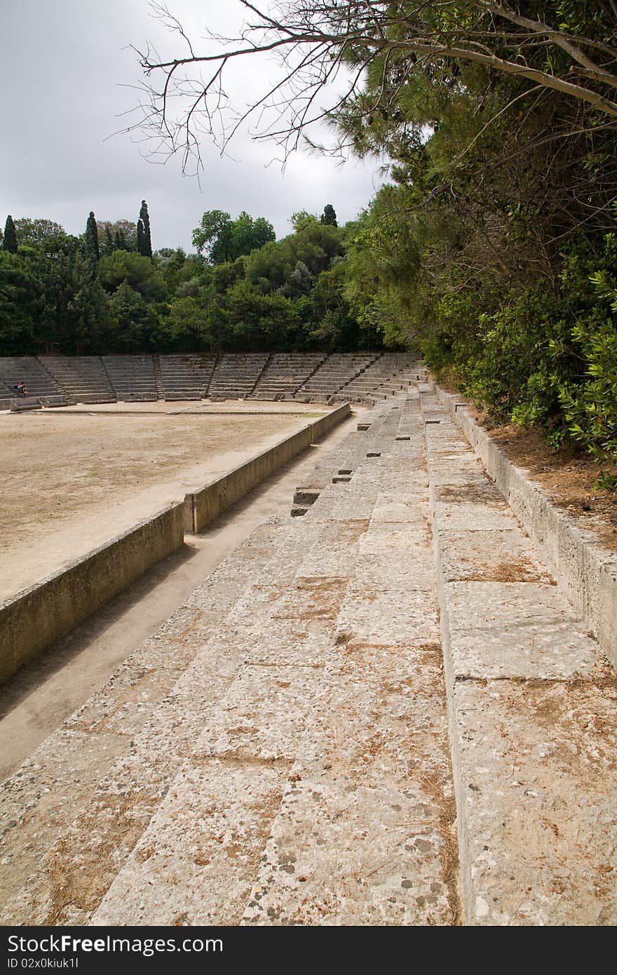 Some remains of the sports stadium acropolis of Monte Smith, Rhodes town in Greece. Some remains of the sports stadium acropolis of Monte Smith, Rhodes town in Greece.