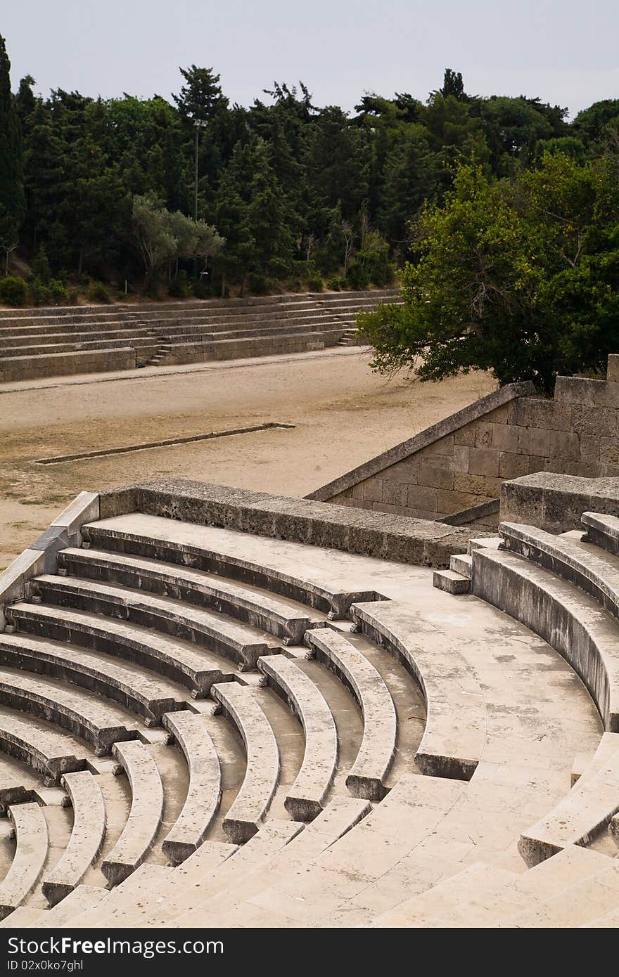 Some remains of the sports stadium and acropolis theatre of Monte Smith, Rhodes town in Greece. Some remains of the sports stadium and acropolis theatre of Monte Smith, Rhodes town in Greece.