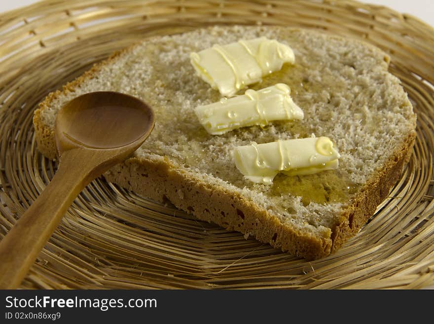 Bread slice with butter and honey. Bread slice with butter and honey