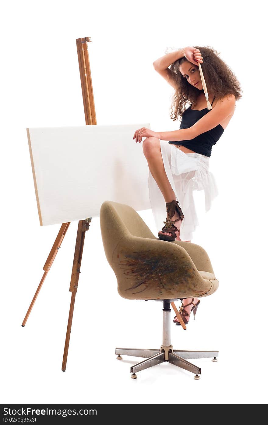 Young woman at atelier with canvas. Young woman at atelier with canvas