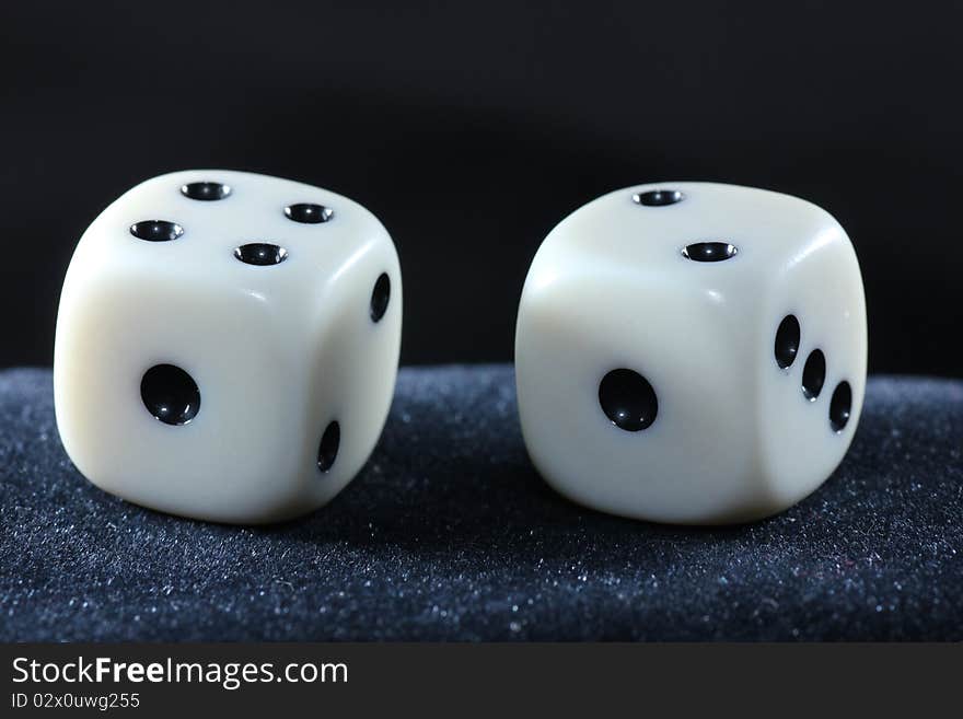 Detail of dice with black background