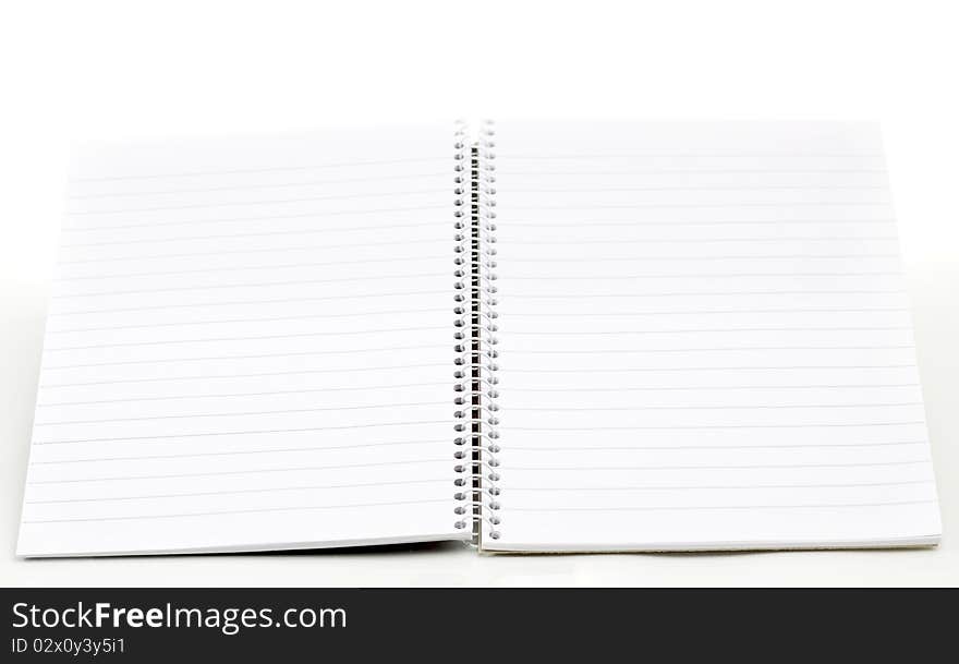 Open empty note book on white