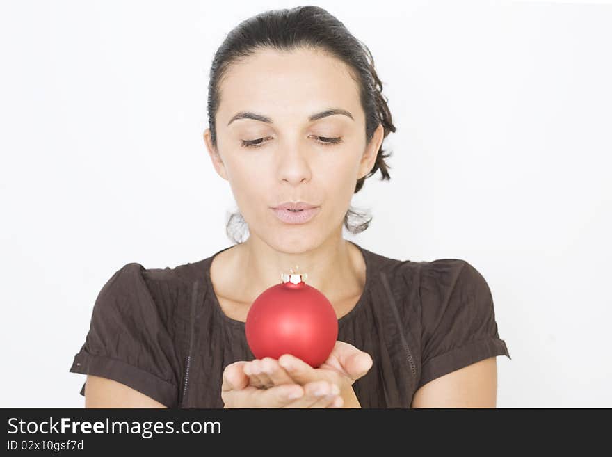 X-mas woman with two red glass beads on Christmas. X-mas woman with two red glass beads on Christmas