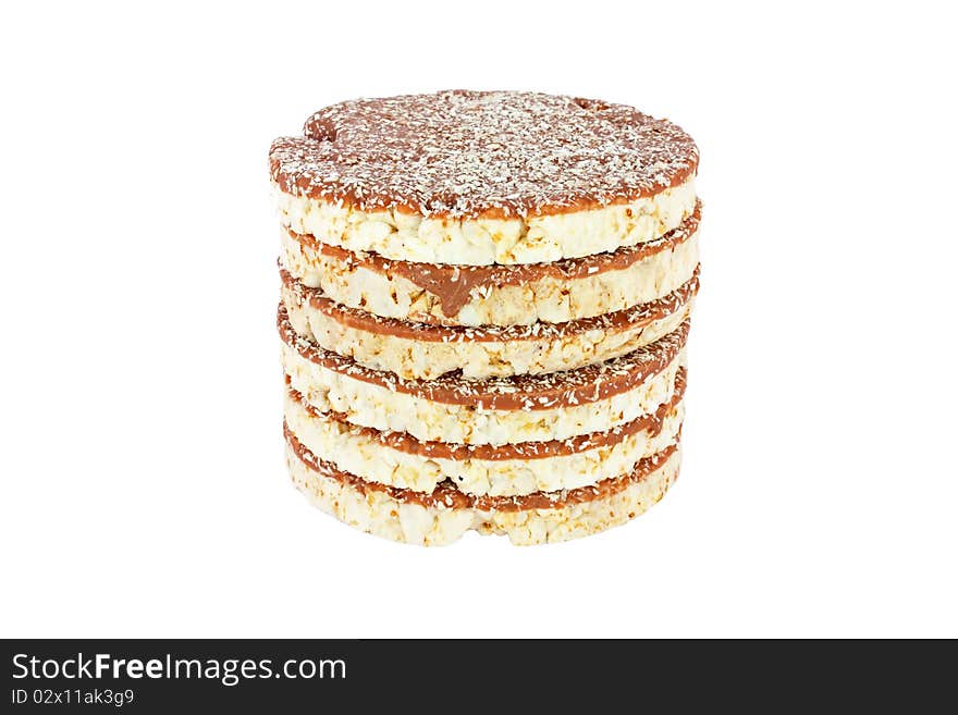 Stack of round crispbread with chocolate isolated on white