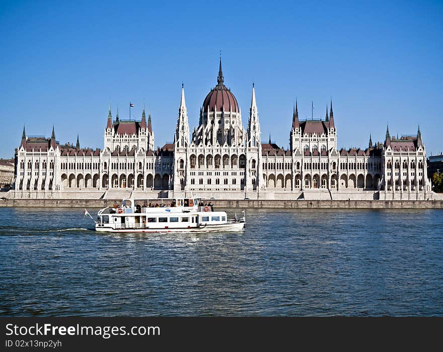 Hungarian Parliament in a sunny day with a ship. Hungarian Parliament in a sunny day with a ship