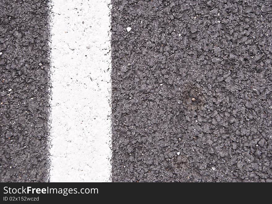 Asphalt with white stripe background wallpaper