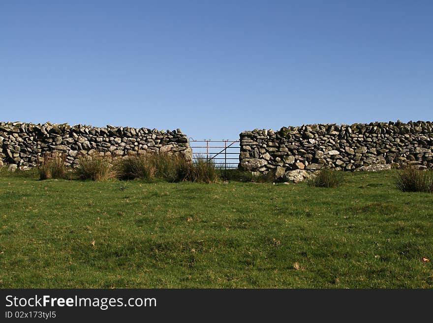 Gate and wall.