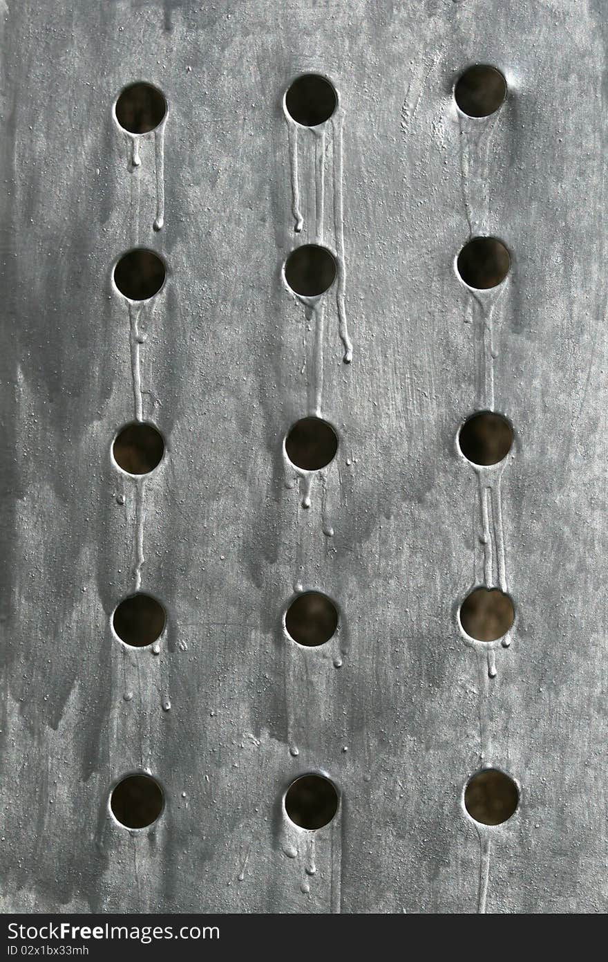 Pattern on a sheet of metal that was drilling a hole other.