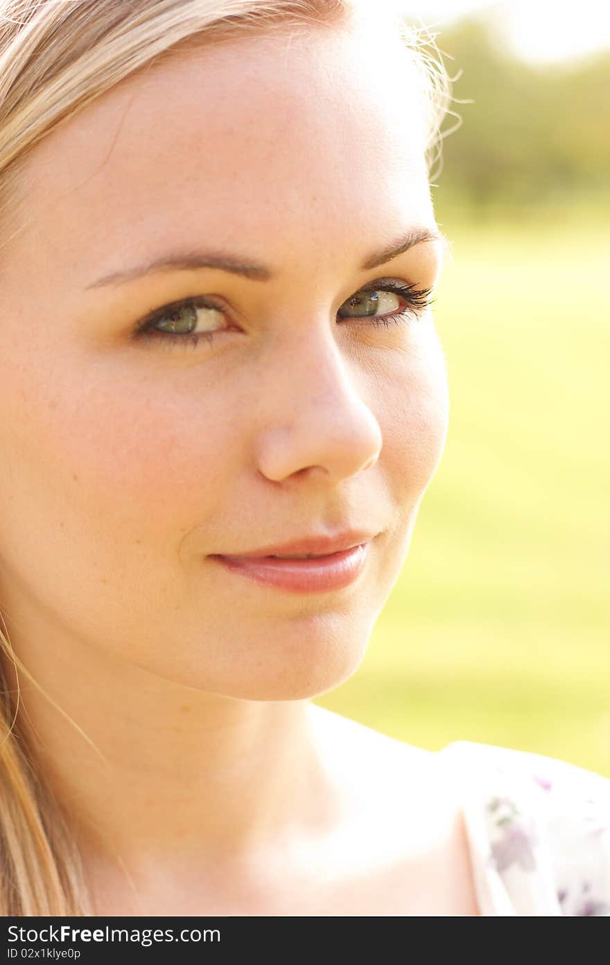 Colorful closeup portrait of smiling lady. Colorful closeup portrait of smiling lady