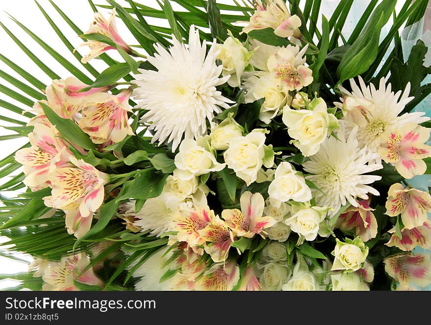 Bouquet flowers on a white background, is isolated. Bouquet flowers on a white background, is isolated.