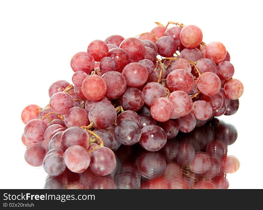 Red grapes on a white background are isolated. Red grapes on a white background are isolated.