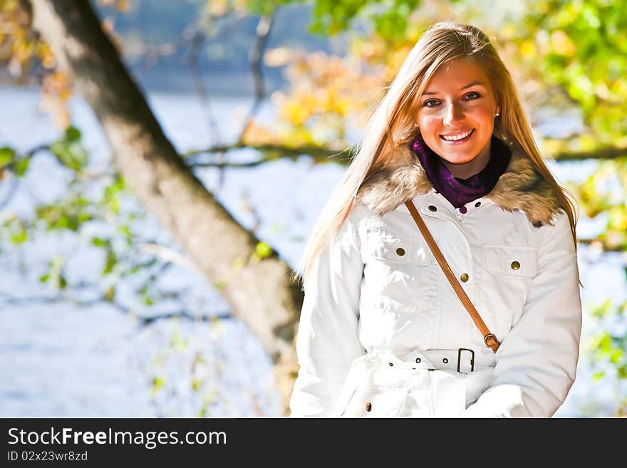 Caucasian young adult blond woman outdoor fall time