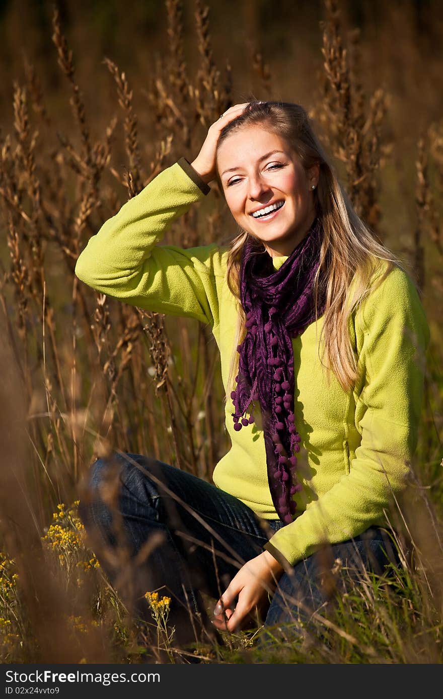 Caucasian young adult blond woman outdoor fall time