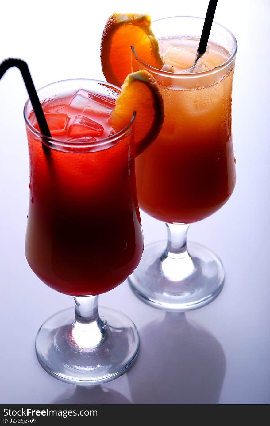 Close-up shot of two colorful cocktails