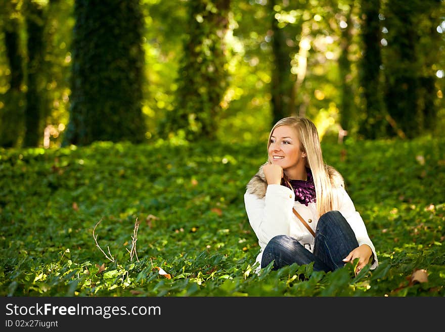 Caucasian young adult blond woman outdoor fall time