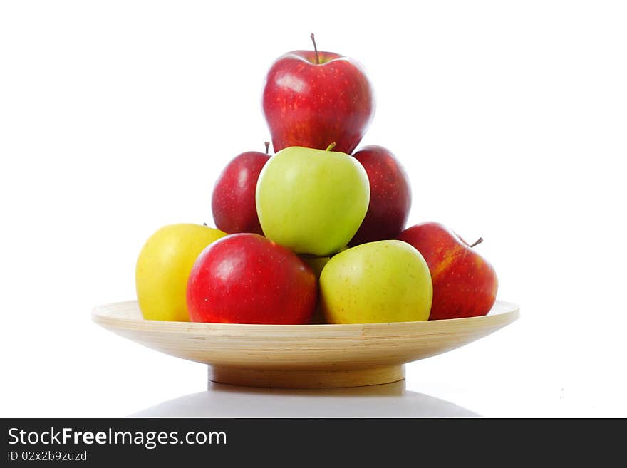 Plate with colorful fresh apples