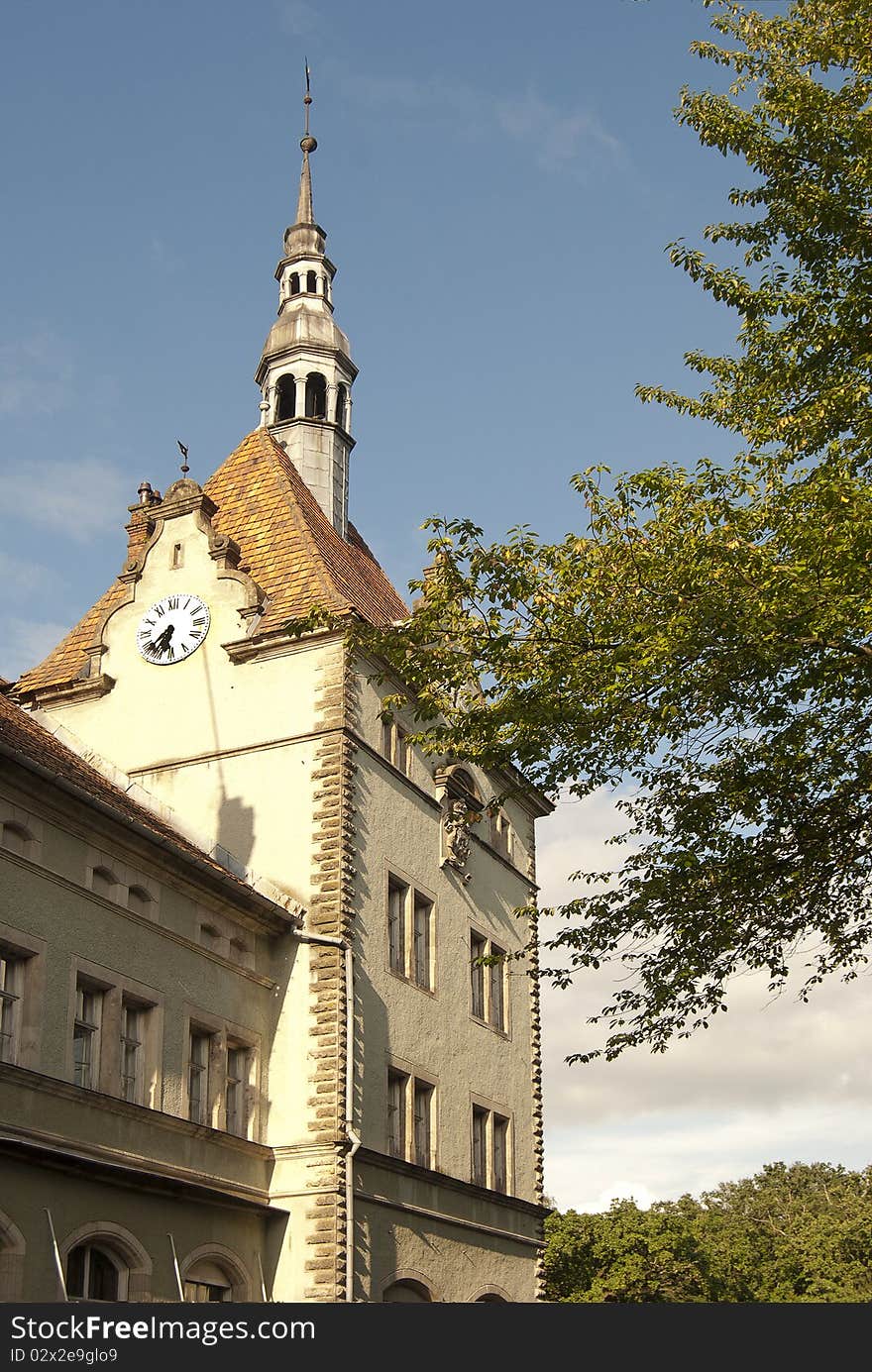 An old historical clock tower of the Shoenborn palace in Ukraine