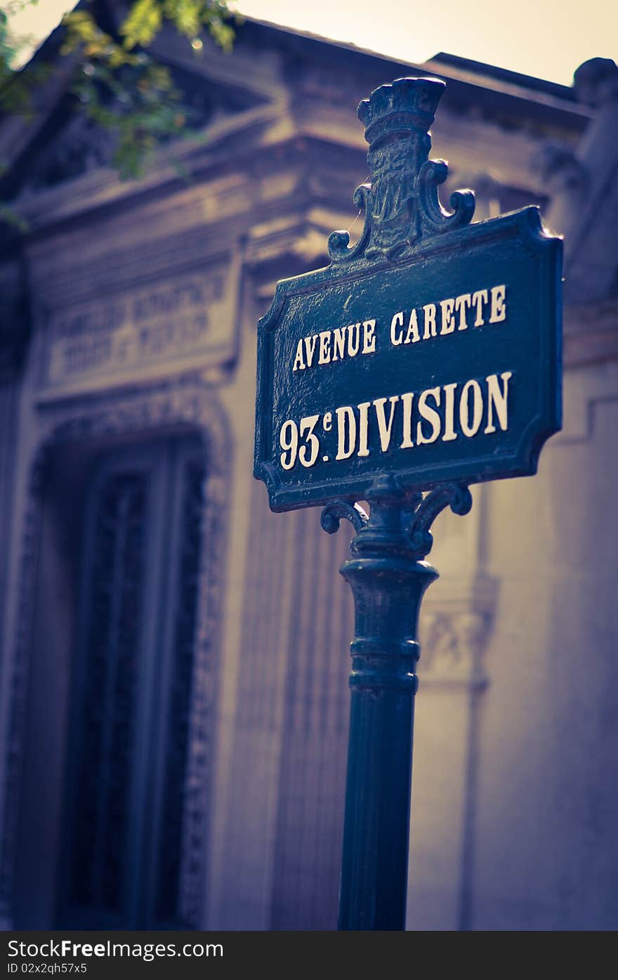 Close up photo of the Avenue Carette sign at Pere Lachaise Cemetary in Paris