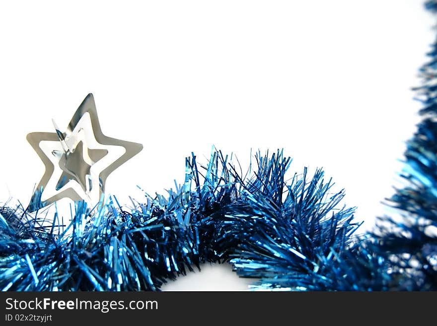 Christmas tinsel with silver star isolated